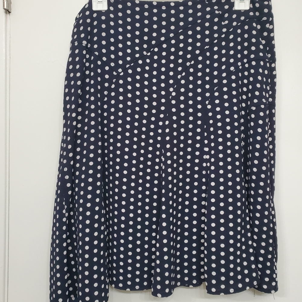 Black and white polka dot skirt with interesting pleats